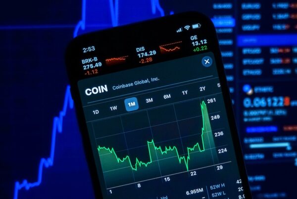 Phone app showing Coinbase stock market prices.