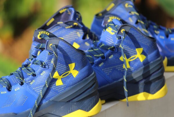 Blue Under Armour sneakers athletic shoes.